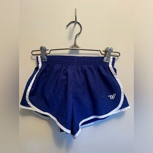 Varsity, girls youth small, blue and white athletic shorts with mesh sides.